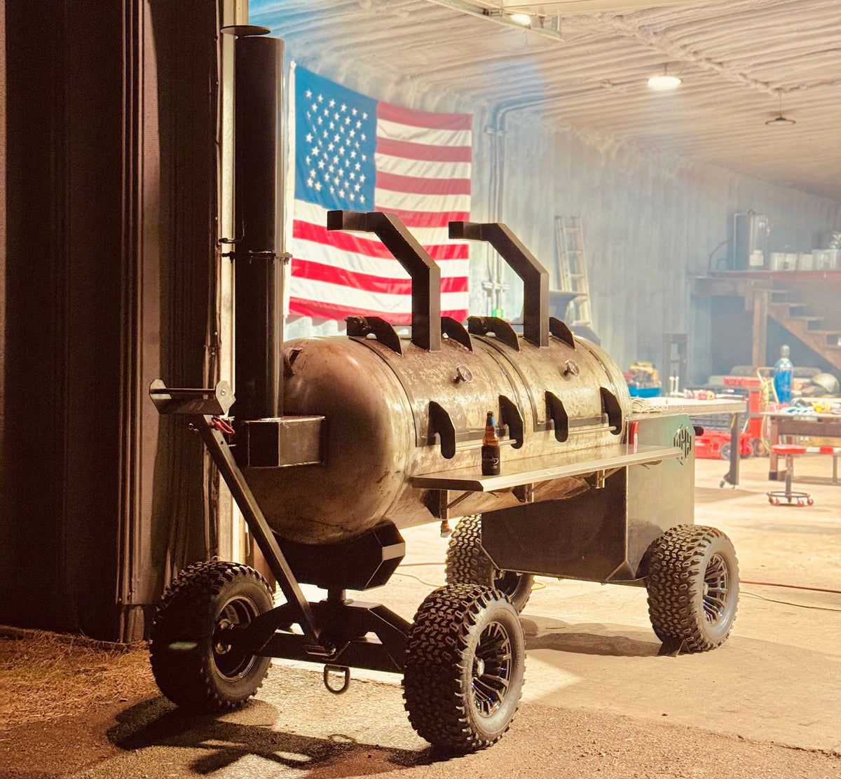Custom offset smoker on a trailer, fabricated by Prestigious Metal Works in Waco TX