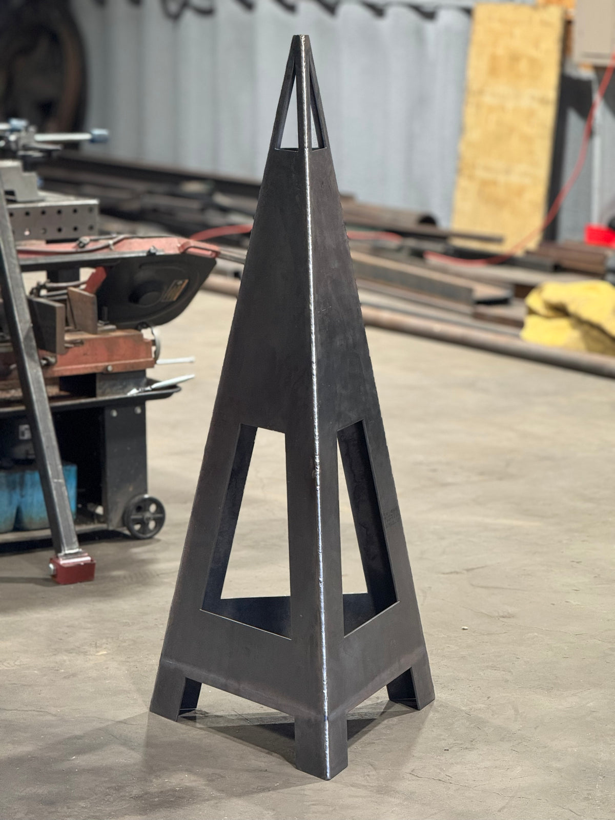 Custom pyramid steel fire pit, plasma-cut and welded in the Prestigious Metal Works shop, Waco TX